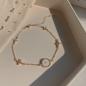 Preview: Großhandel B2B Koreanisches Vintage-Perlenarmband in D005 Gelbgold Sternen Armband